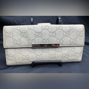 Gucci Cream Embossed GG Continental Wallet with Gold Metal Plaque